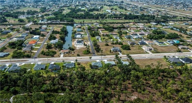 Welcome to this fabulous salt water pool home with a tranquil on Burnt Store Golf Club in Florida - for sale on GolfHomes.com, golf home, golf lot