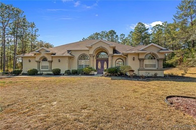 Beautiful Pine Ridge home tucked away on a quiet cul-de-sac on Pine Ridge Community Golf and Country Club in Florida - for sale on GolfHomes.com, golf home, golf lot
