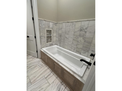 Brand-new 4BR/4.5BA townhome in the private, gated community of on Old Waverly Golf Club, Inc. in Mississippi - for sale on GolfHomes.com, golf home, golf lot