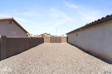 This charming ranch-style 3 bedroom home in the rapidly growing on The Links At Coyote Wash in Arizona - for sale on GolfHomes.com, golf home, golf lot
