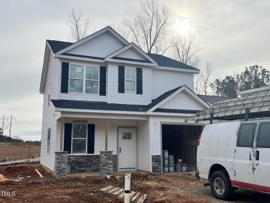 This gorgeous new construction home highlights classic comforts: on Riverwood Golf and Athletic Club in North Carolina - for sale on GolfHomes.com, golf home, golf lot