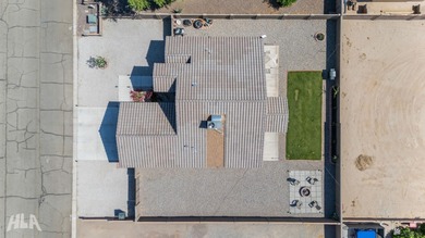 This charming ranch-style 3 bedroom home in the rapidly growing on The Links At Coyote Wash in Arizona - for sale on GolfHomes.com, golf home, golf lot