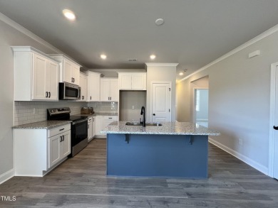 Premium lot! Beautiful new ranch home in Clayton's Ashcroft on Riverwood Golf and Athletic Club in North Carolina - for sale on GolfHomes.com, golf home, golf lot