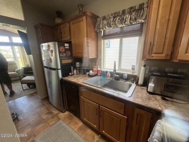 Come see this very clean and well-kept park model in desirable on Juniper Ridge R.V. Golf Resort in Arizona - for sale on GolfHomes.com, golf home, golf lot