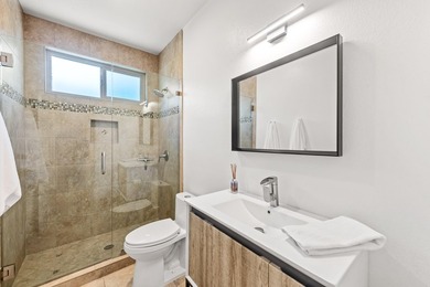 Step into this upgraded Islands 3 model that has been remodeled on Oasis Country Club in California - for sale on GolfHomes.com, golf home, golf lot