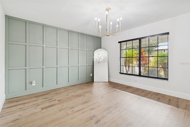 Welcome to this beautifully updated pool home overlooking the on Northdale Golf and Tennis Club in Florida - for sale on GolfHomes.com, golf home, golf lot