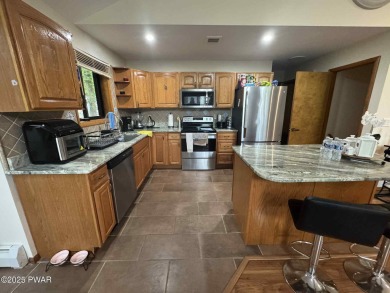 Welcome to this beautifully upgraded 4-bedroom home nestled in on The Hideout Golf in Pennsylvania - for sale on GolfHomes.com, golf home, golf lot