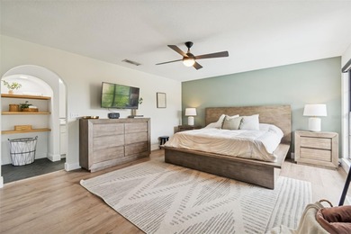 Welcome to this beautifully updated pool home overlooking the on Northdale Golf and Tennis Club in Florida - for sale on GolfHomes.com, golf home, golf lot