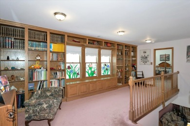 Situated on a tranquil street with picturesque views of the on Ravisloe Country Club in Illinois - for sale on GolfHomes.com, golf home, golf lot