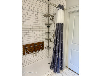 Discover the perfect blend of comfort, convenience, and coastal on Gulf Hills Golf Club in Mississippi - for sale on GolfHomes.com, golf home, golf lot