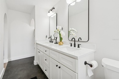 Welcome to this beautifully updated pool home overlooking the on Northdale Golf and Tennis Club in Florida - for sale on GolfHomes.com, golf home, golf lot