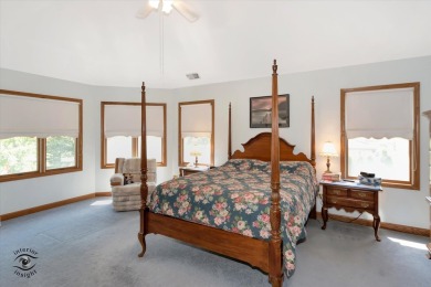 Situated on a tranquil street with picturesque views of the on Ravisloe Country Club in Illinois - for sale on GolfHomes.com, golf home, golf lot