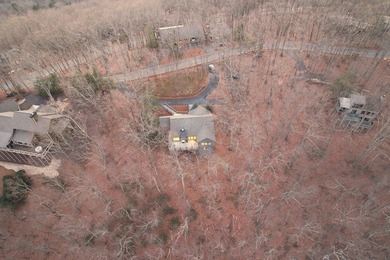 Big Canoe is renowned for its resort-style amenities and on Big Canoe Golf Club - Cherokee in Georgia - for sale on GolfHomes.com, golf home, golf lot