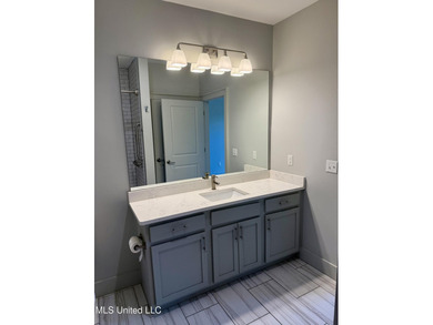 Discover the perfect blend of comfort, convenience, and coastal on Gulf Hills Golf Club in Mississippi - for sale on GolfHomes.com, golf home, golf lot