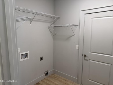 Discover the perfect blend of comfort, convenience, and coastal on Gulf Hills Golf Club in Mississippi - for sale on GolfHomes.com, golf home, golf lot