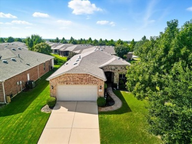 Stunning Surrey Crest Model located in the 55+ community of on Frisco Lakes Golf Course in Texas - for sale on GolfHomes.com, golf home, golf lot