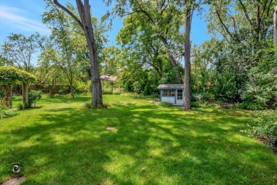 Situated on a tranquil street with picturesque views of the on Ravisloe Country Club in Illinois - for sale on GolfHomes.com, golf home, golf lot