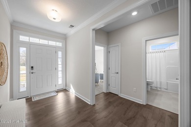 Stylish one-level home in a resort-style community featuring an on Sound Golf Links at Albemarle Plantation in North Carolina - for sale on GolfHomes.com, golf home, golf lot