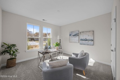 Stylish one-level home in a resort-style community featuring an on Sound Golf Links at Albemarle Plantation in North Carolina - for sale on GolfHomes.com, golf home, golf lot