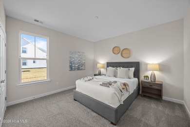 Stylish one-level home in a resort-style community featuring an on Sound Golf Links at Albemarle Plantation in North Carolina - for sale on GolfHomes.com, golf home, golf lot