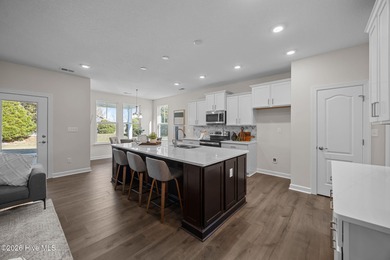 Stylish one-level home in a resort-style community featuring an on Sound Golf Links at Albemarle Plantation in North Carolina - for sale on GolfHomes.com, golf home, golf lot