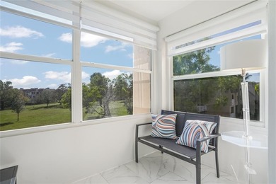 Bright 2-bed, 2-bath condo in Sunrise Lakes 55+ community on Sunrise Lakes Phase III in Florida - for sale on GolfHomes.com, golf home, golf lot