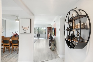 Bright 2-bed, 2-bath condo in Sunrise Lakes 55+ community on Sunrise Lakes Phase III in Florida - for sale on GolfHomes.com, golf home, golf lot