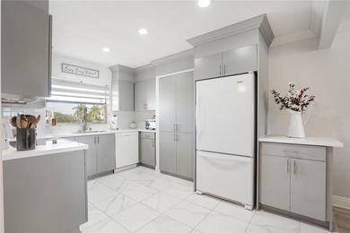 Bright 2-bed, 2-bath condo in Sunrise Lakes 55+ community on Sunrise Lakes Phase III in Florida - for sale on GolfHomes.com, golf home, golf lot