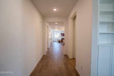 LOWEST-PRICED HOME IN THE AREA! Discover elevated desert living on Verrado Golf Club  in Arizona - for sale on GolfHomes.com, golf home, golf lot