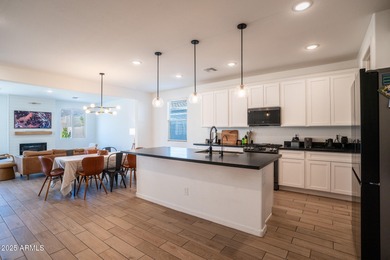 LOWEST-PRICED HOME IN THE AREA! Discover elevated desert living on Verrado Golf Club  in Arizona - for sale on GolfHomes.com, golf home, golf lot