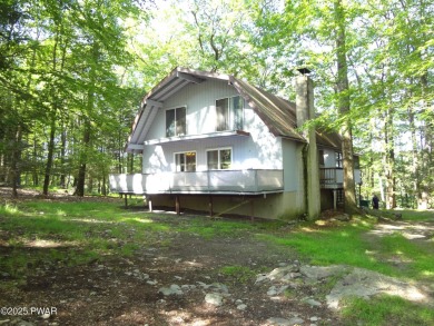 LARGE LAKE WALLENPAUPACK HOME WITH GOLF COURSE VIEWS IN on Paupack Hills Golf and Country Club in Pennsylvania - for sale on GolfHomes.com, golf home, golf lot