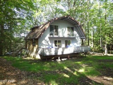 LARGE LAKE WALLENPAUPACK HOME WITH GOLF COURSE VIEWS IN on Paupack Hills Golf and Country Club in Pennsylvania - for sale on GolfHomes.com, golf home, golf lot