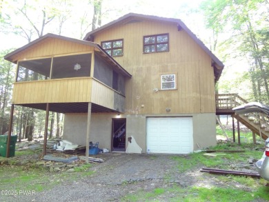 LARGE LAKE WALLENPAUPACK HOME WITH GOLF COURSE VIEWS IN on Paupack Hills Golf and Country Club in Pennsylvania - for sale on GolfHomes.com, golf home, golf lot