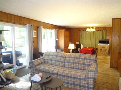 LARGE LAKE WALLENPAUPACK HOME WITH GOLF COURSE VIEWS IN on Paupack Hills Golf and Country Club in Pennsylvania - for sale on GolfHomes.com, golf home, golf lot
