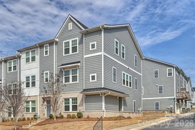 This elegant three story end-unit townhome located at City Park on Renaissance Park Golf Course in North Carolina - for sale on GolfHomes.com, golf home, golf lot