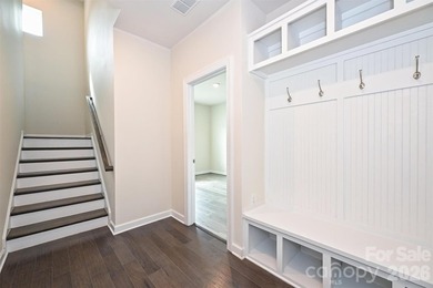 This elegant three story end-unit townhome located at City Park on Renaissance Park Golf Course in North Carolina - for sale on GolfHomes.com, golf home, golf lot