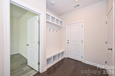 This elegant three story end-unit townhome located at City Park on Renaissance Park Golf Course in North Carolina - for sale on GolfHomes.com, golf home, golf lot