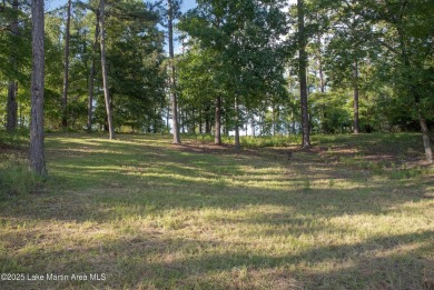 Nestled in the serene Phase I of The Heritage, Lot 57 offers an on Wicker Point Golf Club in Alabama - for sale on GolfHomes.com, golf home, golf lot