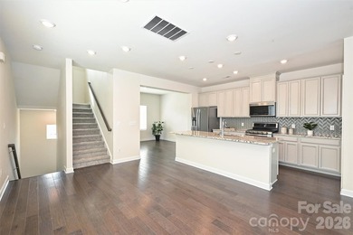 This elegant three story end-unit townhome located at City Park on Renaissance Park Golf Course in North Carolina - for sale on GolfHomes.com, golf home, golf lot