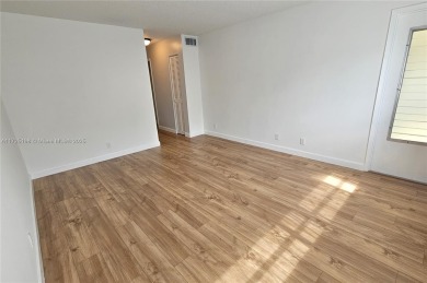 Step into modern comfort at 1000 NE 14th Ave #404! This on The Diplomat Golf Resort and Spa in Florida - for sale on GolfHomes.com, golf home, golf lot
