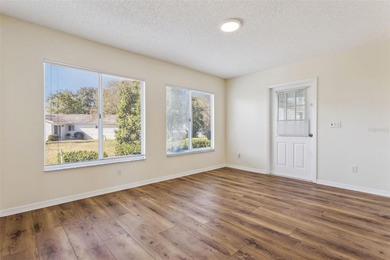 One or more photo(s) has been virtually staged. This inviting on The Links of Spruce Creek in Florida - for sale on GolfHomes.com, golf home, golf lot