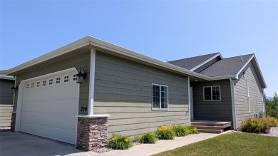 Offered is a 3-bedroom, 3-bathroom townhome with 2,592 square on Village Greens Golf Club in Montana - for sale on GolfHomes.com, golf home, golf lot