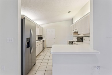 One or more photo(s) has been virtually staged. This inviting on The Links of Spruce Creek in Florida - for sale on GolfHomes.com, golf home, golf lot