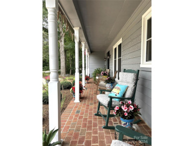 Explore this 4-bedroom, 3.5-bathroom home nestled alongside a on Catawba Springs Golf Course At Lake Hickory  in North Carolina - for sale on GolfHomes.com, golf home, golf lot