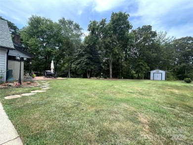 Explore this 4-bedroom, 3.5-bathroom home nestled alongside a on Catawba Springs Golf Course At Lake Hickory  in North Carolina - for sale on GolfHomes.com, golf home, golf lot