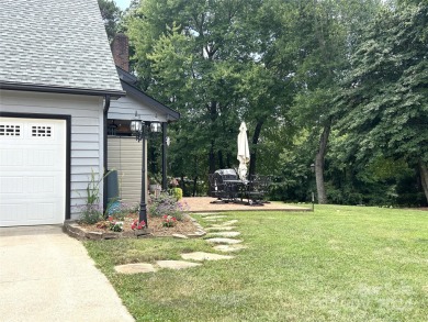 Explore this 4-bedroom, 3.5-bathroom home nestled alongside a on Catawba Springs Golf Course At Lake Hickory  in North Carolina - for sale on GolfHomes.com, golf home, golf lot