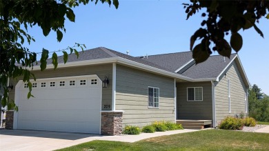Offered is a 3-bedroom, 3-bathroom townhome with 2,592 square on Village Greens Golf Club in Montana - for sale on GolfHomes.com, golf home, golf lot