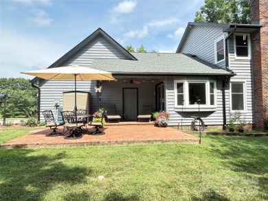 Explore this 4-bedroom, 3.5-bathroom home nestled alongside a on Catawba Springs Golf Course At Lake Hickory  in North Carolina - for sale on GolfHomes.com, golf home, golf lot