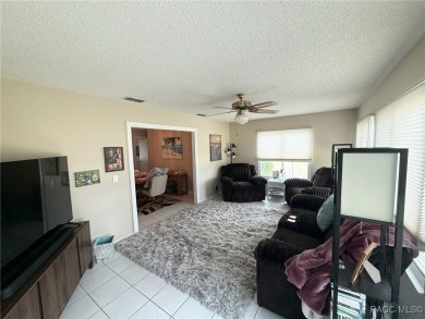 Welcome to this beautifully maintained home nestled in the on Stonecrest Golf and Club Club in Florida - for sale on GolfHomes.com, golf home, golf lot