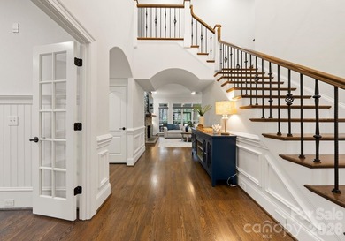 Set on a level one-acre lot on the 5th hole of Trump National on Trump National Golf Club Charlotte in North Carolina - for sale on GolfHomes.com, golf home, golf lot